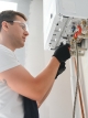 Engineer working on a boiler installation